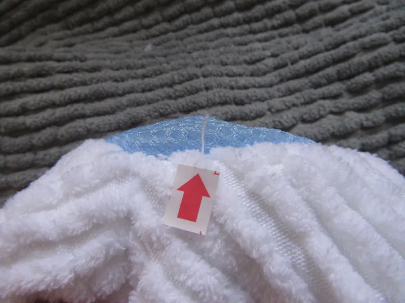 Close-up of a visible seam and thread defect recorded for inspection review
